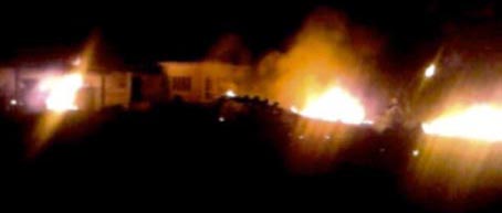Bin Laden’s Abbottabad compound in flames. Apparently, the fires are mainly due to a crashed US helicopter. The picture comes from a neighbor’s cell phone.